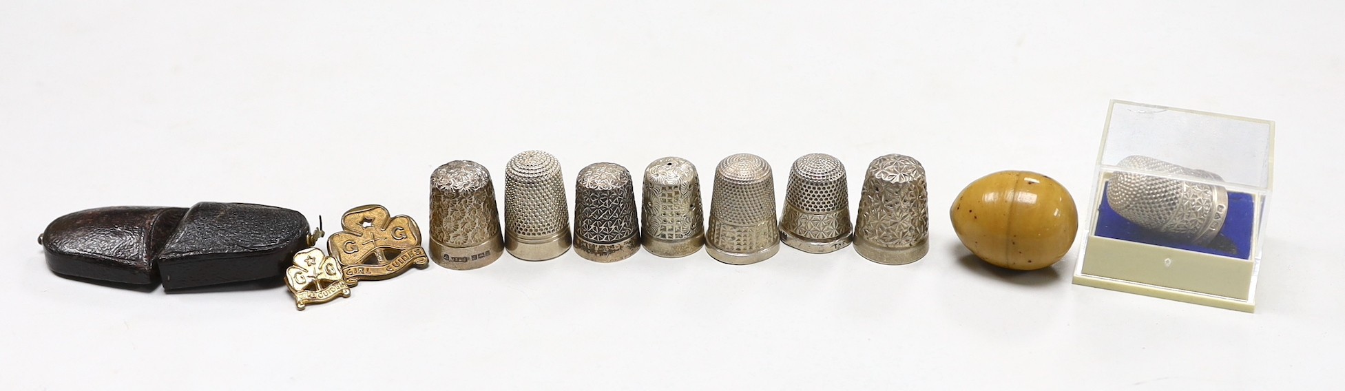 Eight assorted silver thimbles, including one in fitted leather case and two other items, etc.